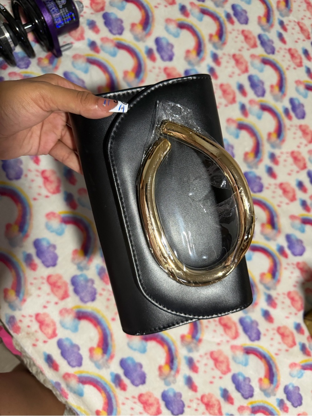 Chic Black Clutch with Gold Teardrop Handle